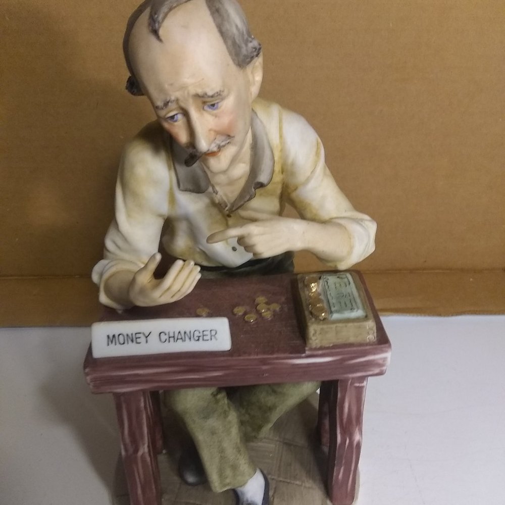 Money Changer Figurine